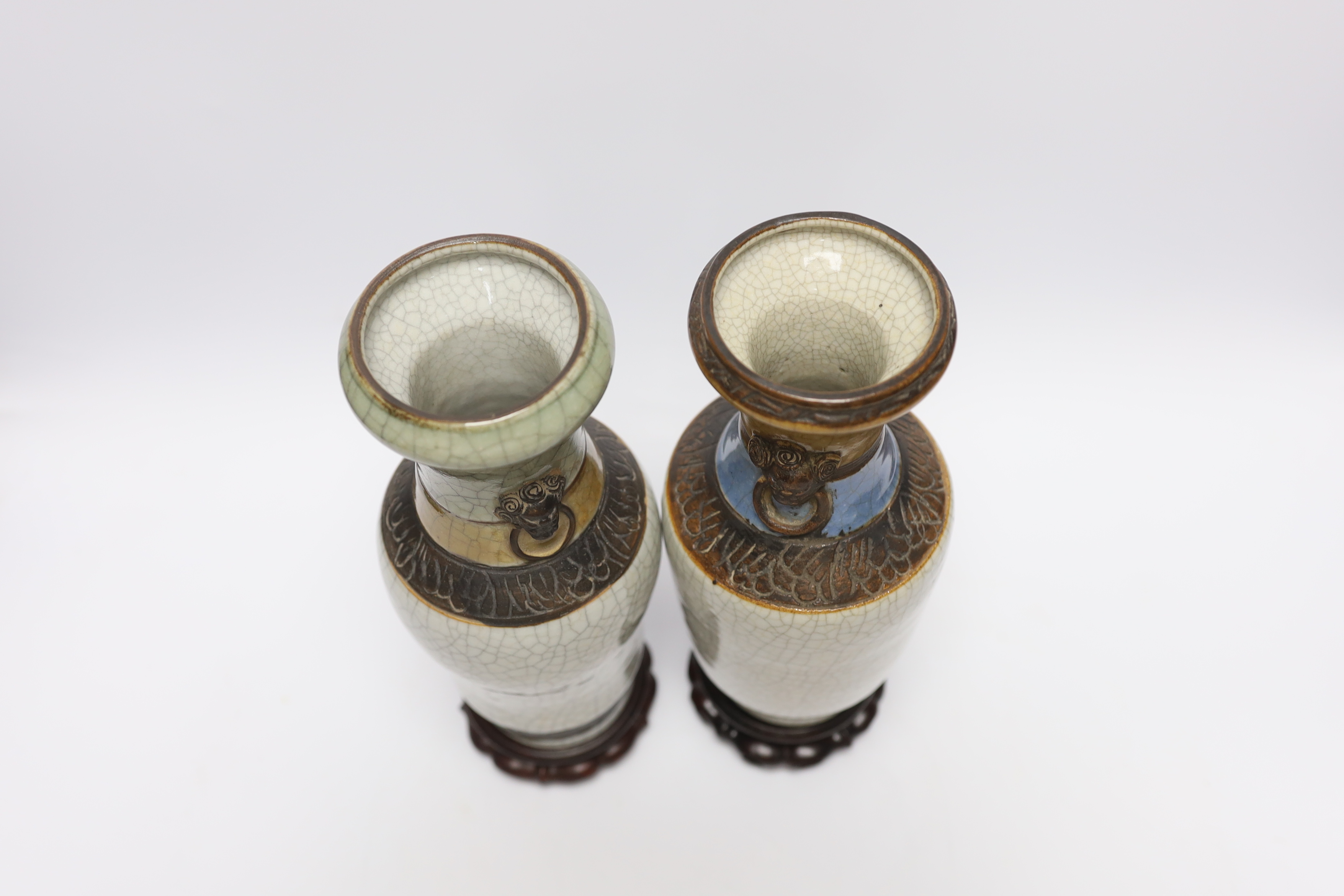 Two Chinese crackle glaze vases, Guanxu period, with stands, 25cm excluding stands